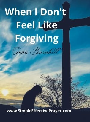 Kneeling at the cross for help to feel like forgiving