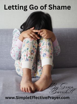 Photo of a young person trying to hide her shame
